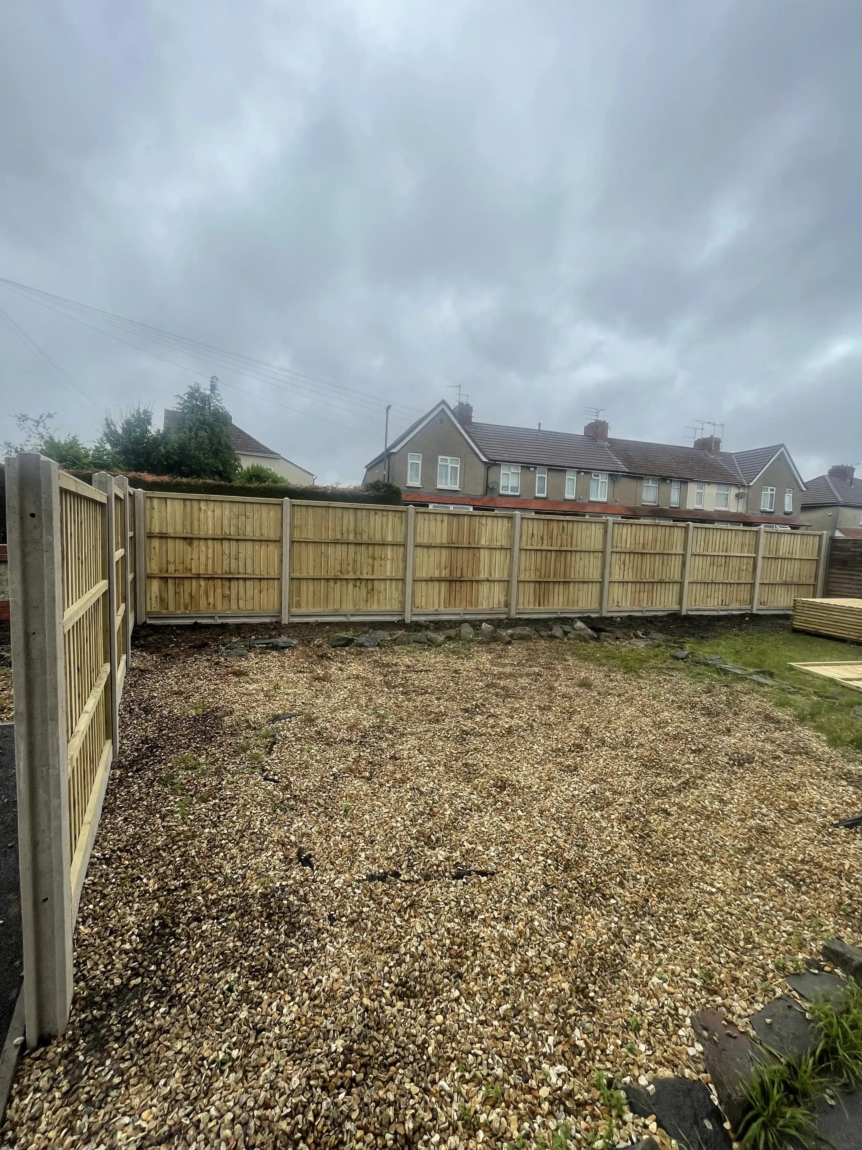 Closeboard fence enclosing a new build garden plot
